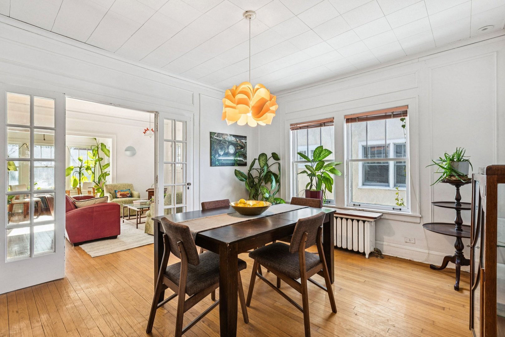 1201 Noyes Street Evanston, IL 60201 - Photo 10 of 50 a dining room filled chandelier and wooden floor