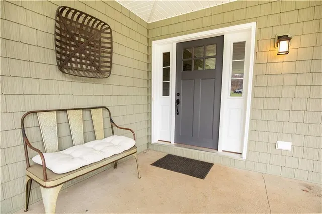 a bathroom with a toilet and shower