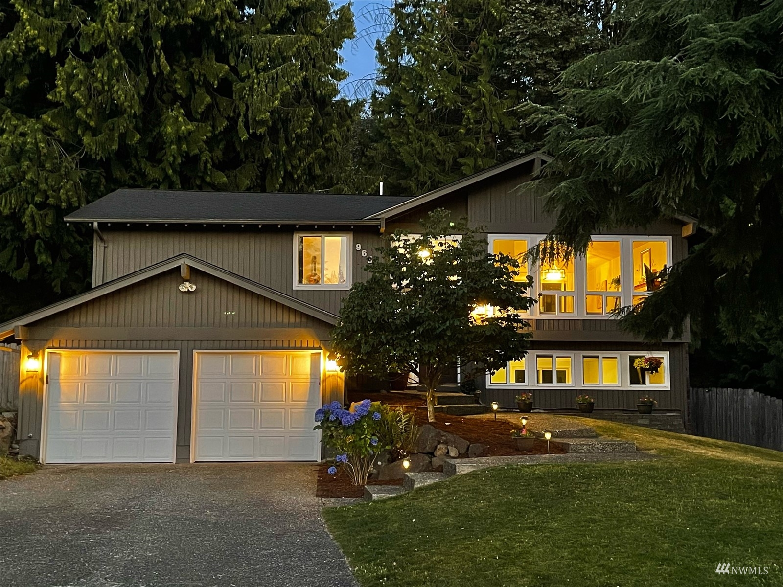 9651 Northeast 201st Street Bothell, WA 98011 - Photo 1 of 39 a view of a house with a yard
