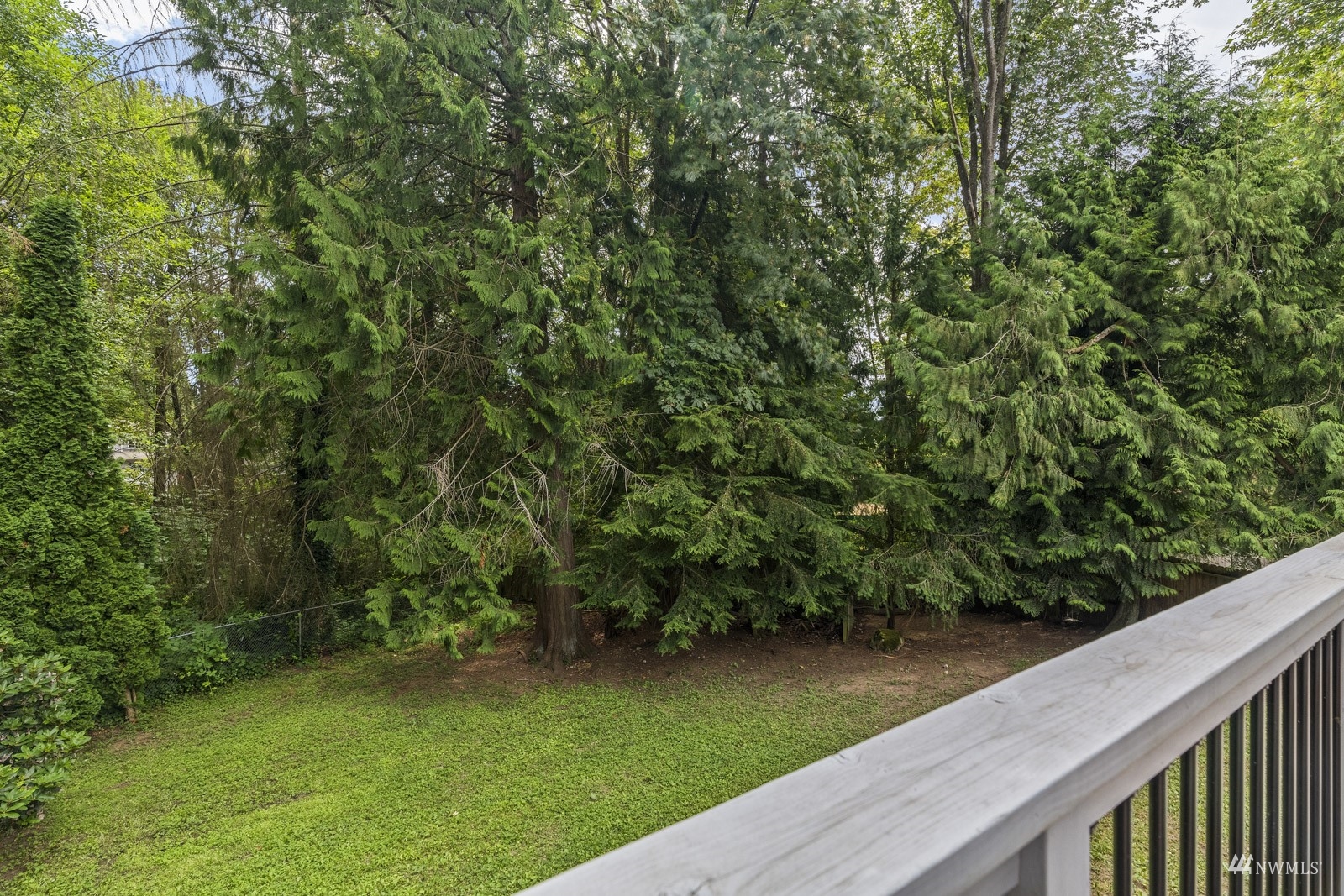 9651 Northeast 201st Street Bothell, WA 98011 - Photo 11 of 39 a view of a garden from a balcony