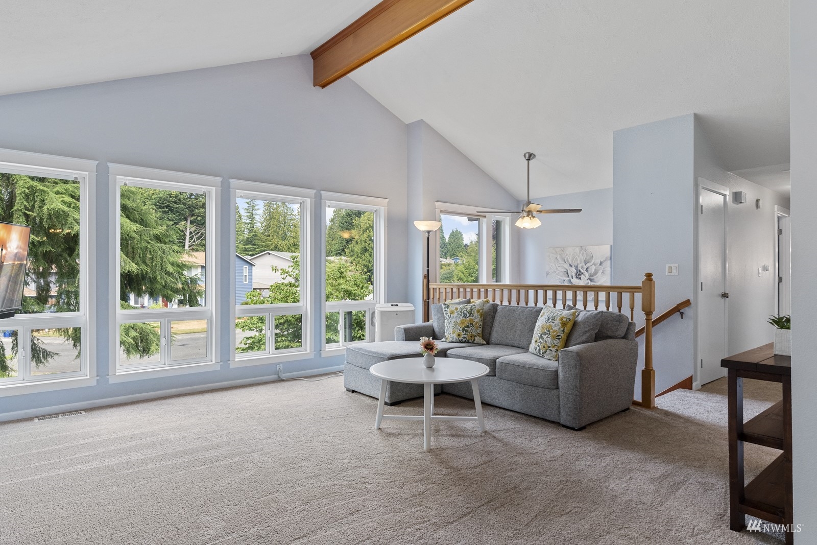 9651 Northeast 201st Street Bothell, WA 98011 - Photo 12 of 39 a living room with furniture and a large window
