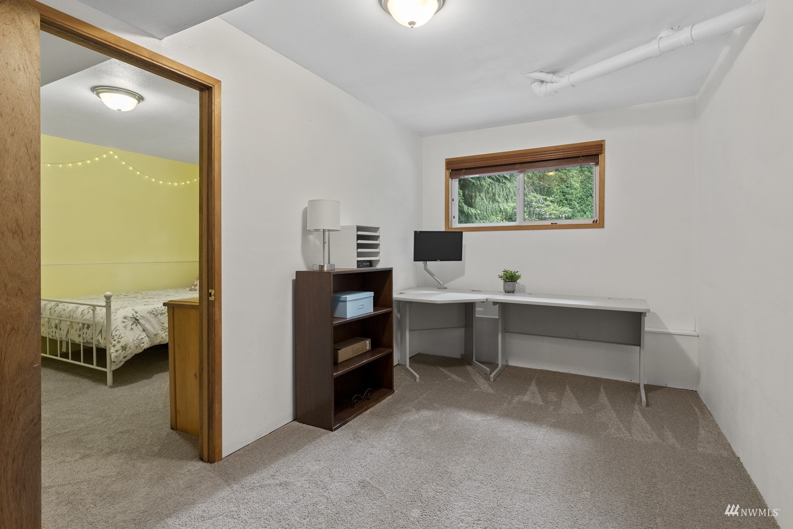 9651 Northeast 201st Street Bothell, WA 98011 - Photo 25 of 39 a reading room with furniture and a window