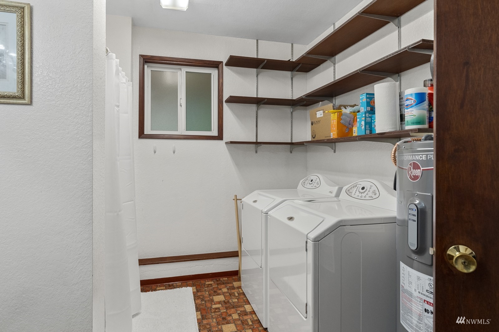9651 Northeast 201st Street Bothell, WA 98011 - Photo 27 of 39 a utility room with dryer and washer