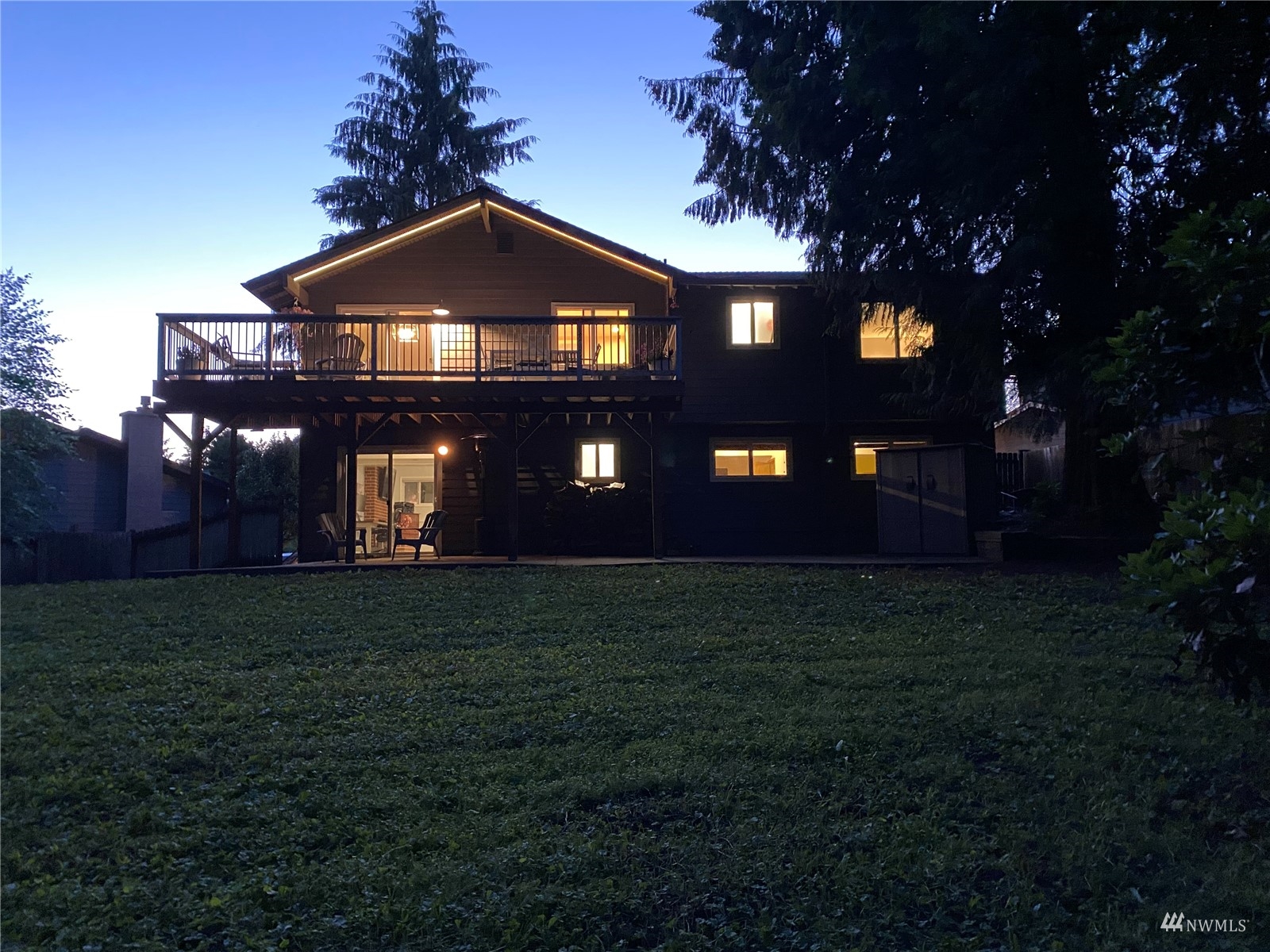9651 Northeast 201st Street Bothell, WA 98011 - Photo 39 of 39 a front view of a house with garden