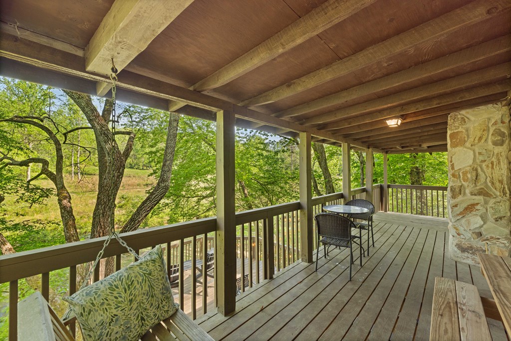 459 Mill Stone Mountain Lane Blue Ridge, GA 30513 - Photo 14 of 25 a view of balcony with wooden floor