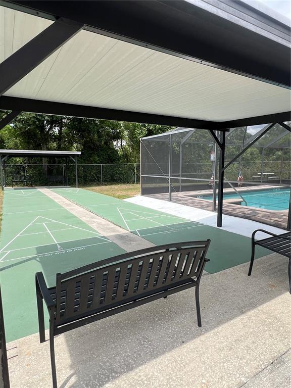 1005 Whitehurst Road, Unit 92 Plant City, FL 33563 - Photo 29 of 29 a view of a two chairs in the patio