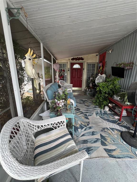1005 Whitehurst Road, Unit 92 Plant City, FL 33563 - Photo 4 of 29 a view of a porch with furniture