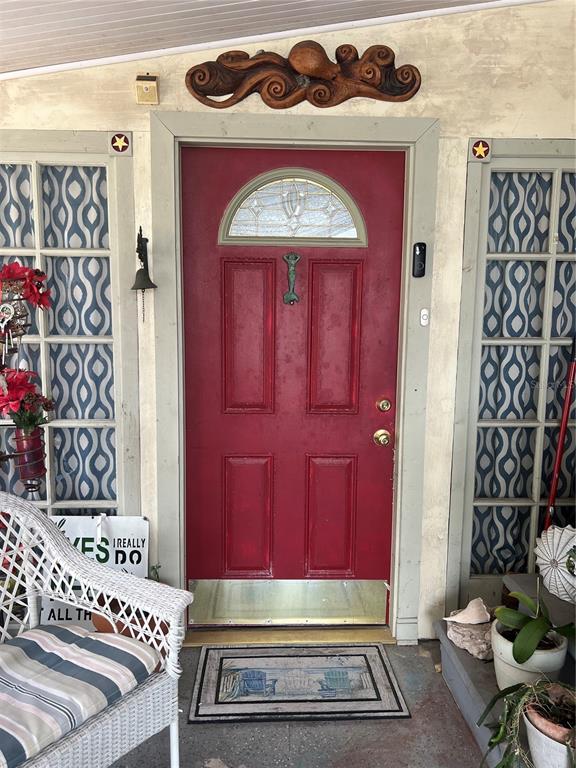 1005 Whitehurst Road, Unit 92 Plant City, FL 33563 - Photo 5 of 29 a view of an entryway with a rug