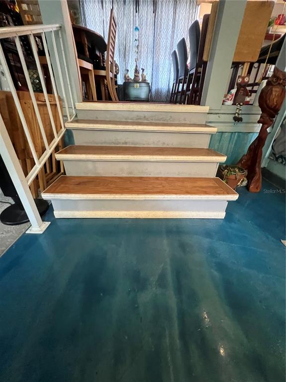 1005 Whitehurst Road, Unit 92 Plant City, FL 33563 - Photo 8 of 29 a view of entryway with wooden floor