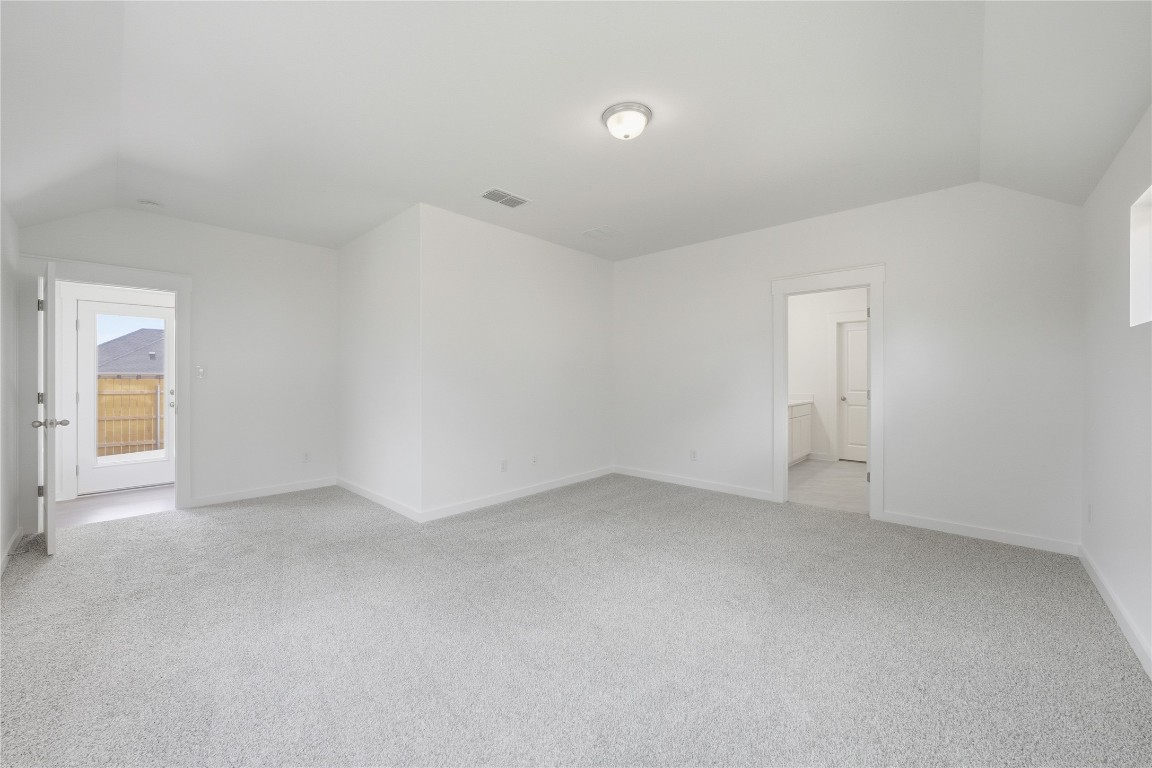 13501 Barn Chime Street Elgin, TX 78621 - Photo 7 of 19 an empty room with a natural light