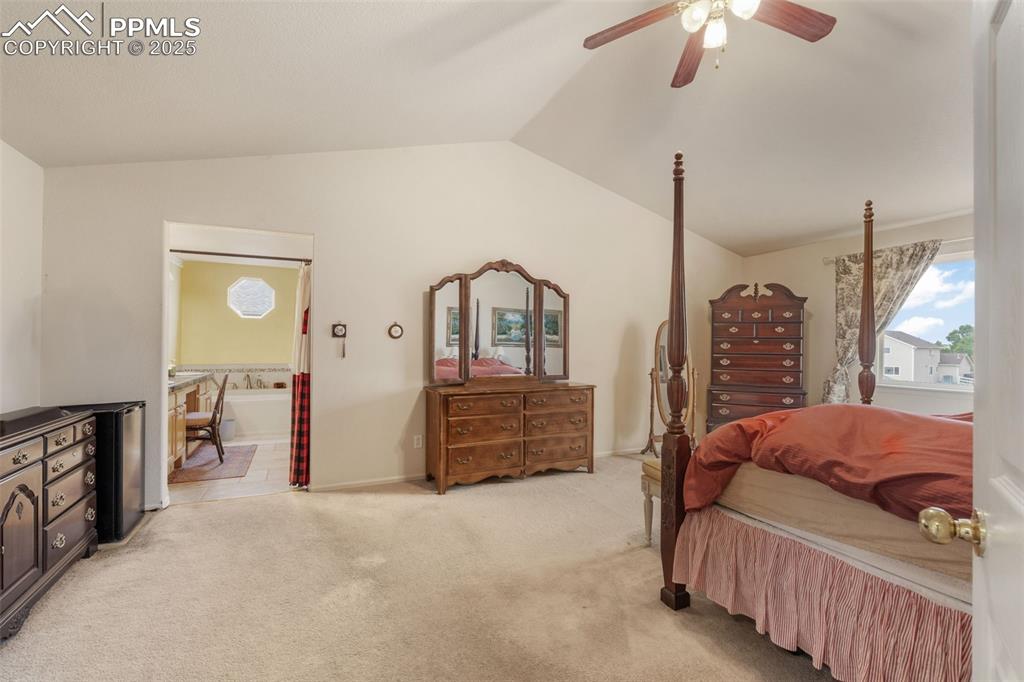 8654 Champie Road Peyton, CO 80831 - Photo 28 of 40 a bedroom with furniture and a dresser