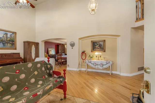 a living room with furniture and a table
