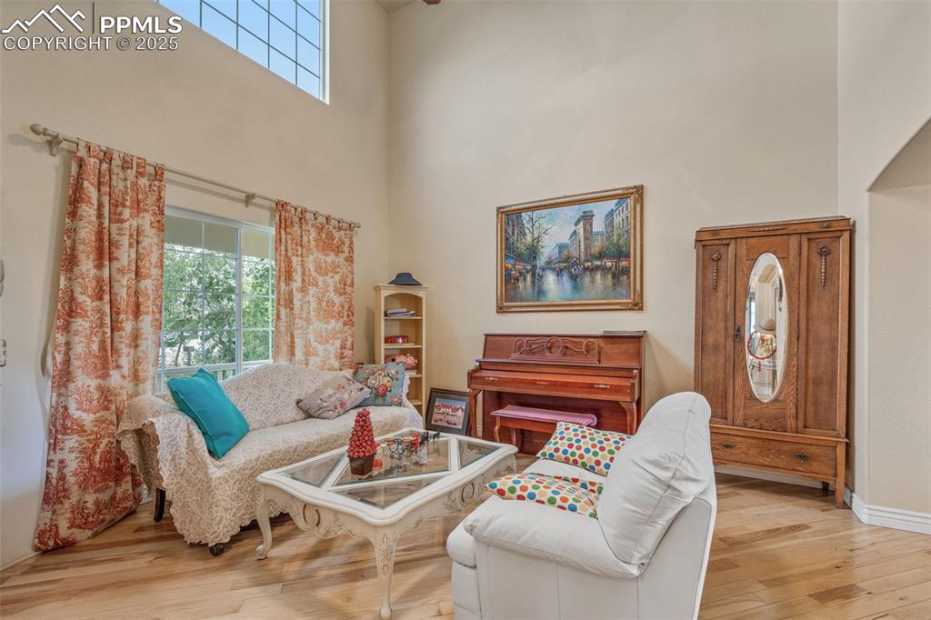 8654 Champie Road Peyton, CO 80831 - Photo 5 of 40 a living room with furniture and a large window