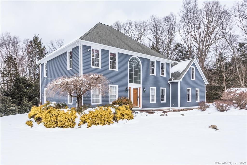9 Winesap Road Newtown, CT 06482 - Photo 1 of 1 a front view of house with yard and trees around