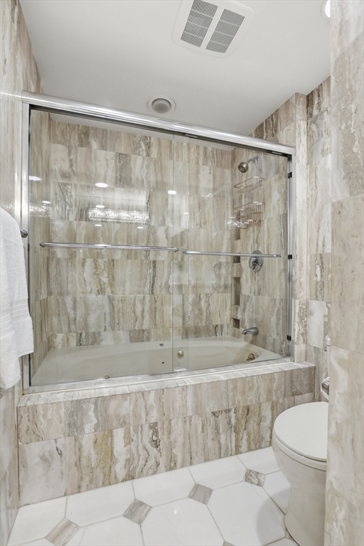 83 Church Street, Unit 15 Winchester, MA 01890 - Photo 26 of 34 a bathroom with a shower and a toilet