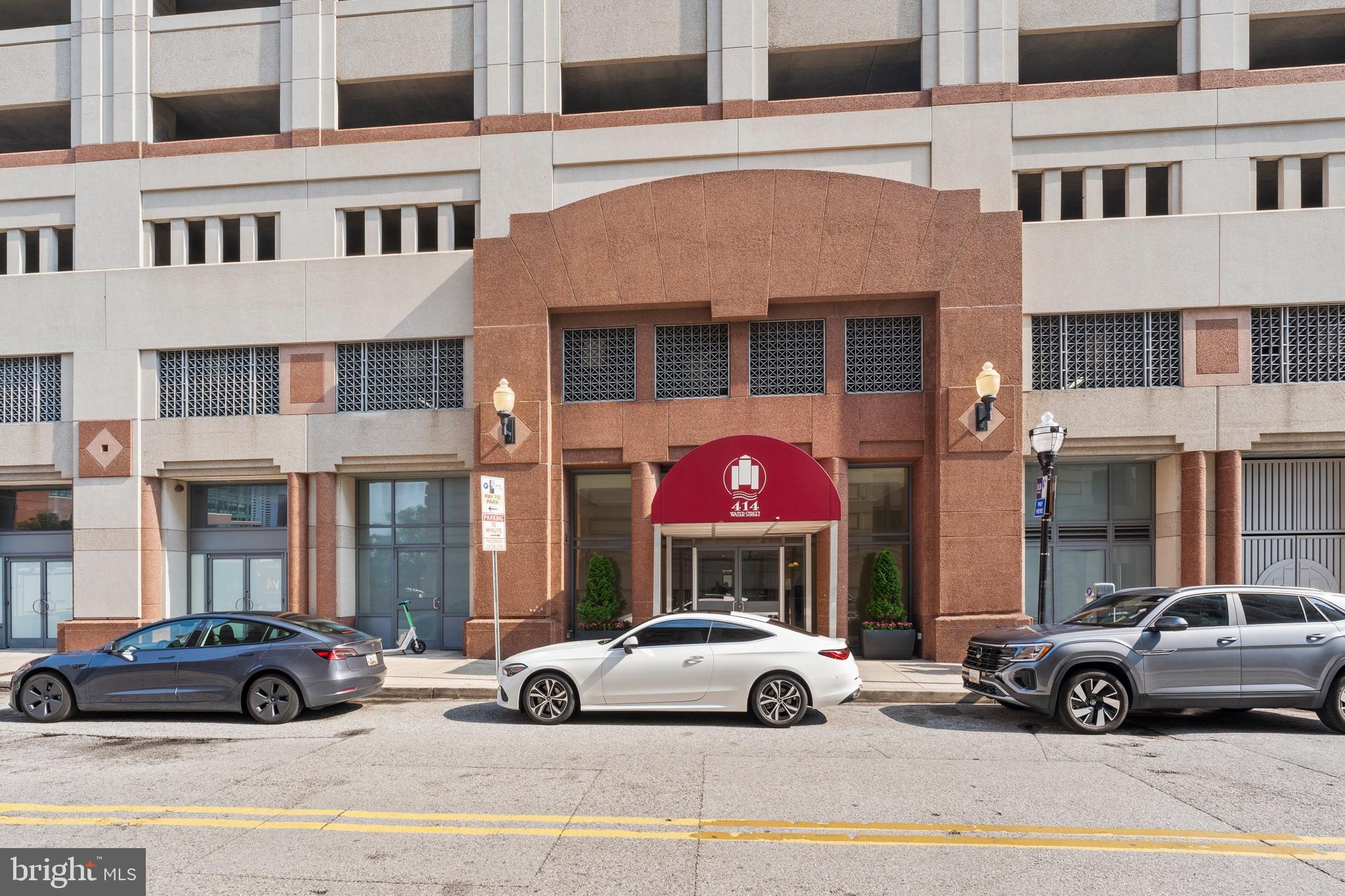 a view of a street with cars