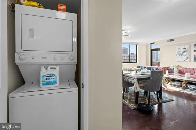 a view of dining room with furniture and wooden floor