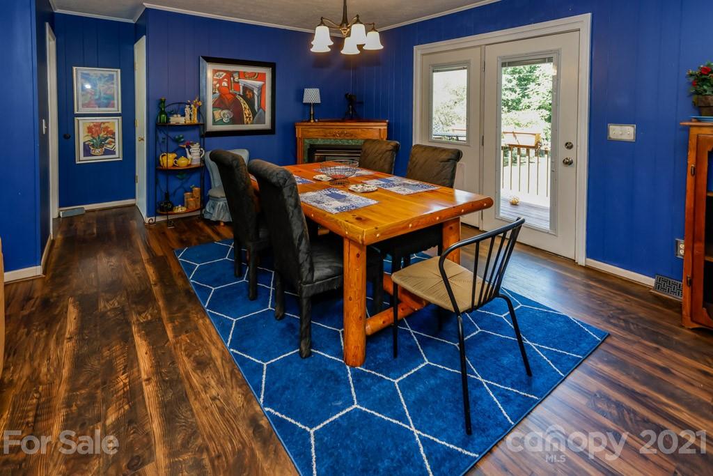 147 Ridgeland Drive Rutherfordton, NC 28139 - Photo 13 of 37 a view of a dining room with furniture and wooden floor