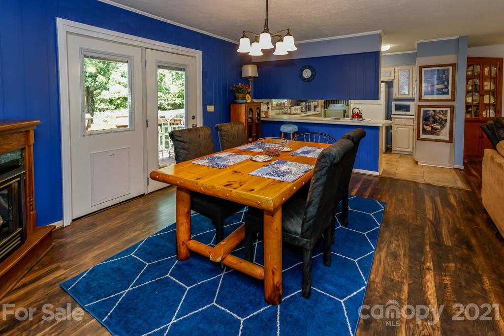 147 Ridgeland Drive Rutherfordton, NC 28139 - Photo 14 of 37 a view of a dining room with furniture window and wooden floor