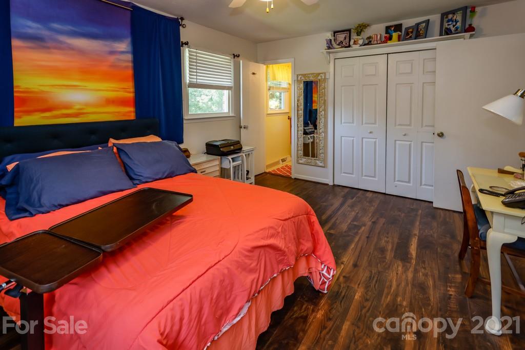 147 Ridgeland Drive Rutherfordton, NC 28139 - Photo 17 of 37 a bed room with a bed and a television