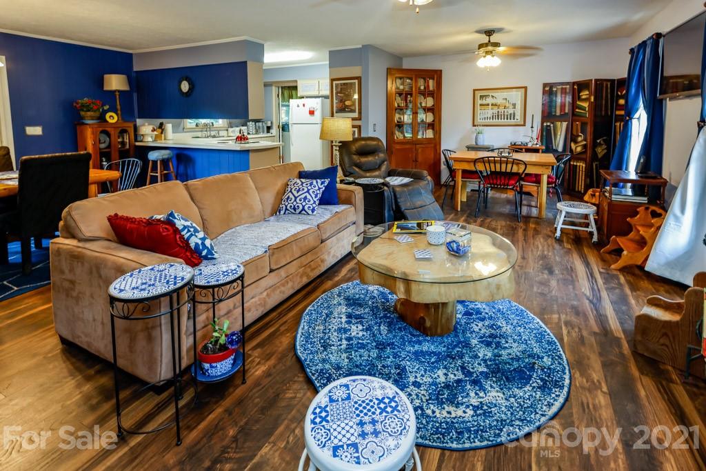 147 Ridgeland Drive Rutherfordton, NC 28139 - Photo 5 of 37 a living room with furniture and a table