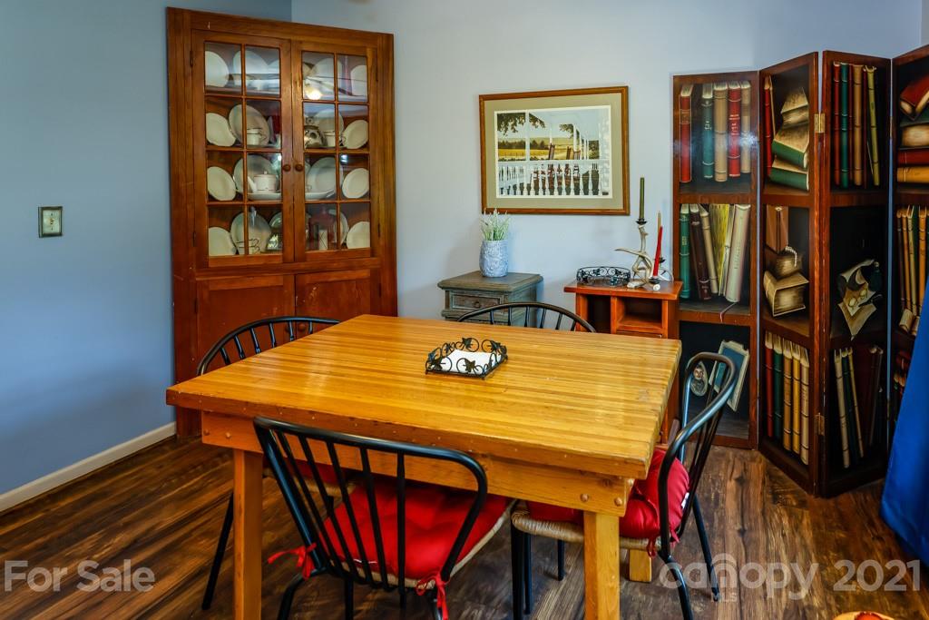 147 Ridgeland Drive Rutherfordton, NC 28139 - Photo 6 of 37 a view of a dining room with furniture and chandelier
