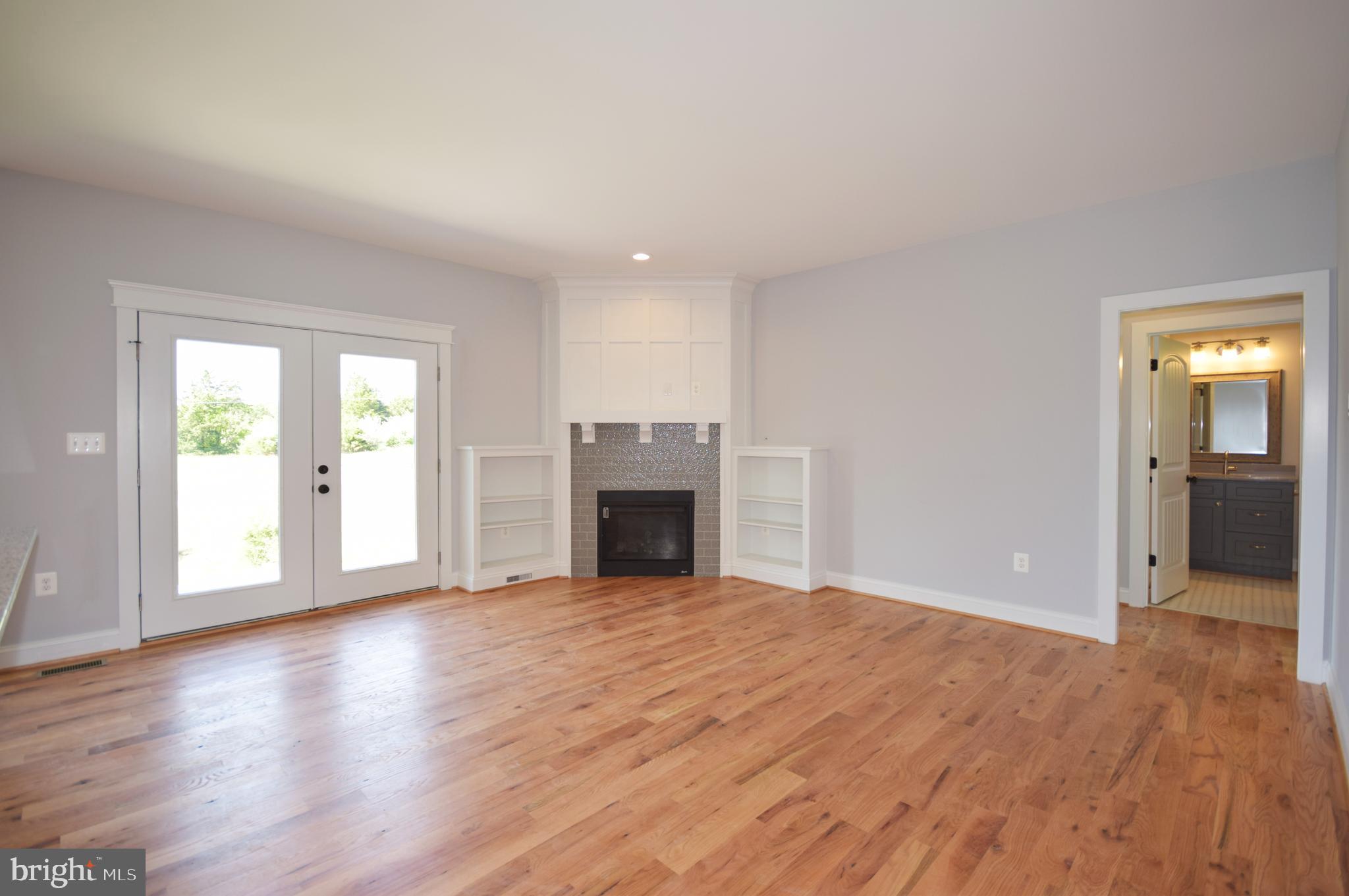 286 Riding Chapel Road Stephens City, VA 22655 - Photo 13 of 41 family room w/fireplace & craftsman mantle & built