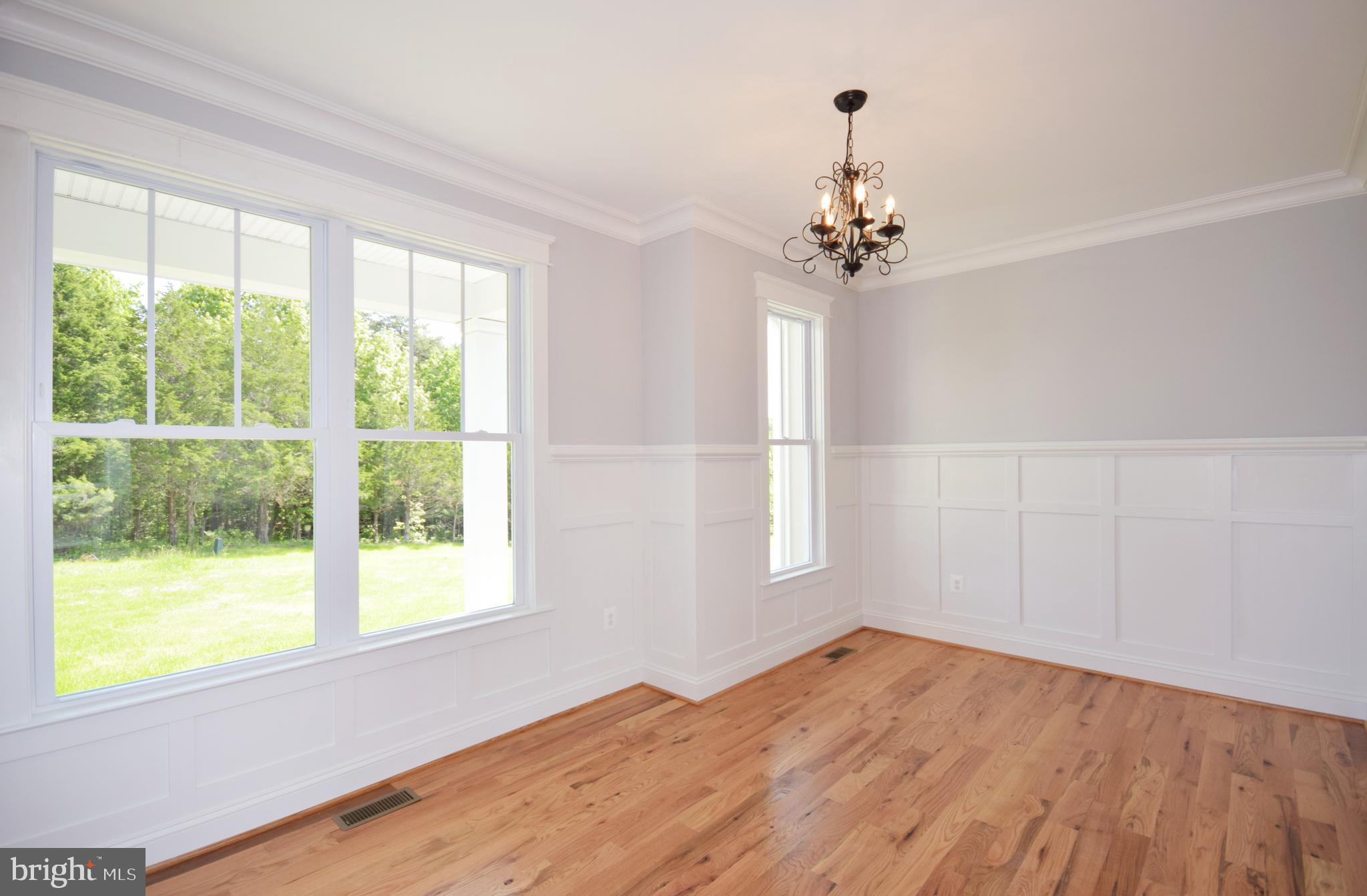 286 Riding Chapel Road Stephens City, VA 22655 - Photo 10 of 41 Formal dining with wainscoating/hardwood