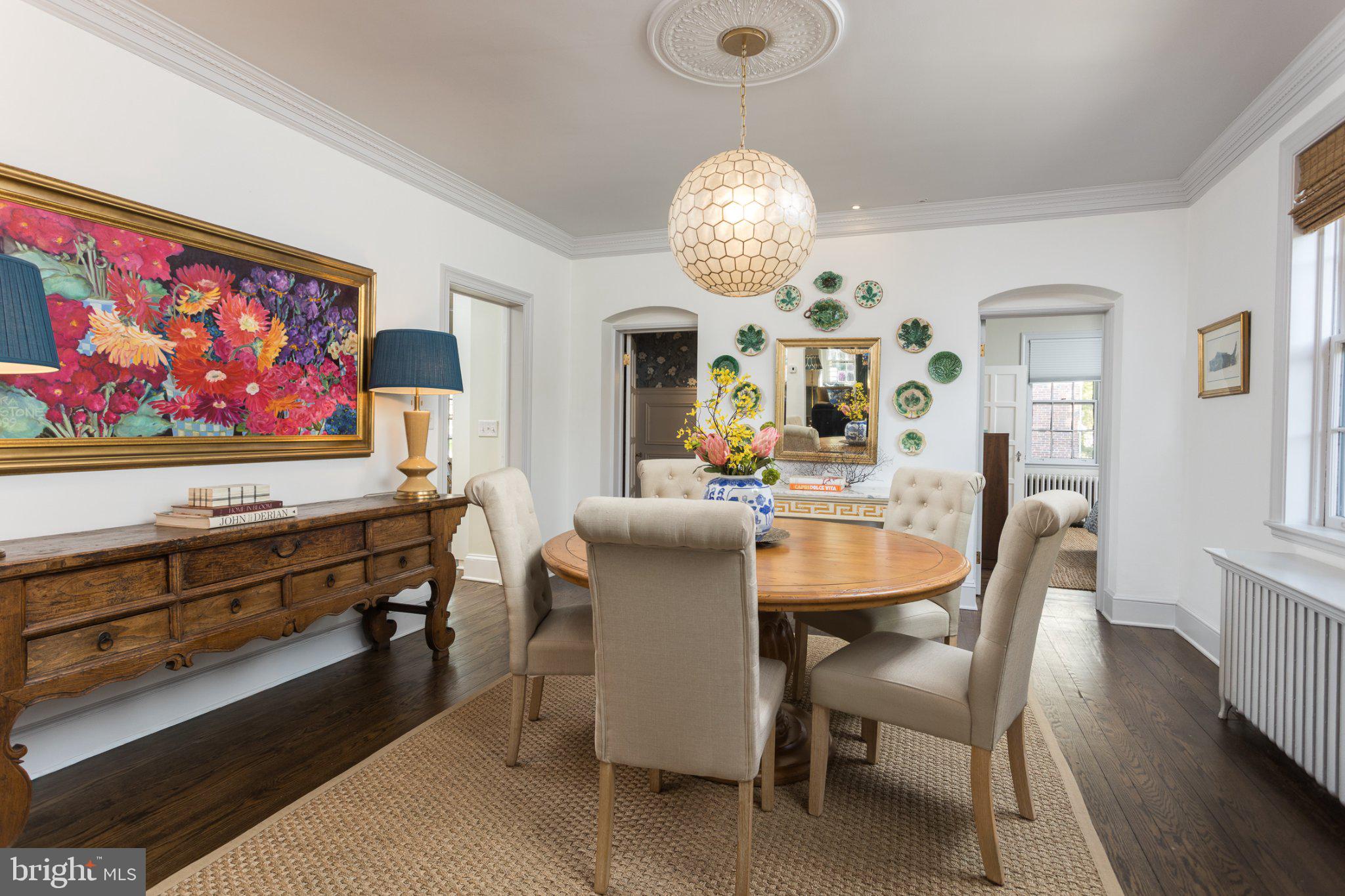 7005 Copeleigh Road Baltimore, MD 21212 - Photo 15 of 51 Charming dining space with vibrant art.