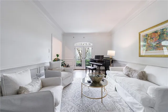 a kitchen with cabinets stainless steel appliances and a window