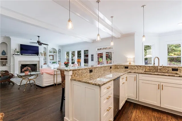 a bathroom with a sink double vanity and a mirror