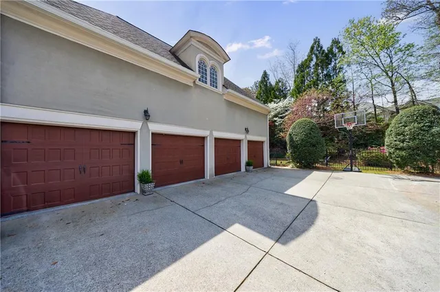 a living room with furniture and a chair