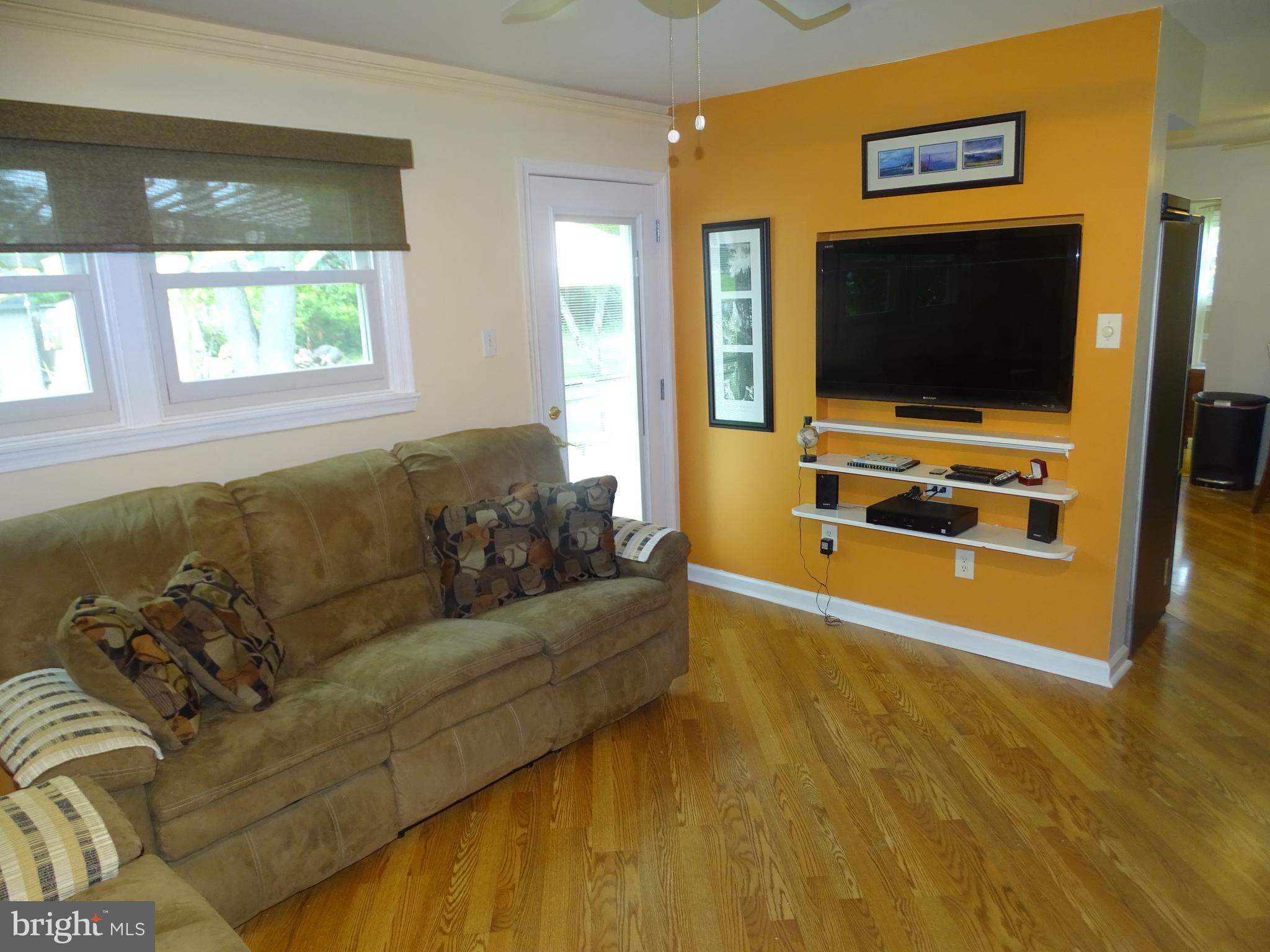 699 Cedarbrook Road Southampton, PA 18966 - Photo 12 of 30 Family Room with Accent Lighting and TV Included