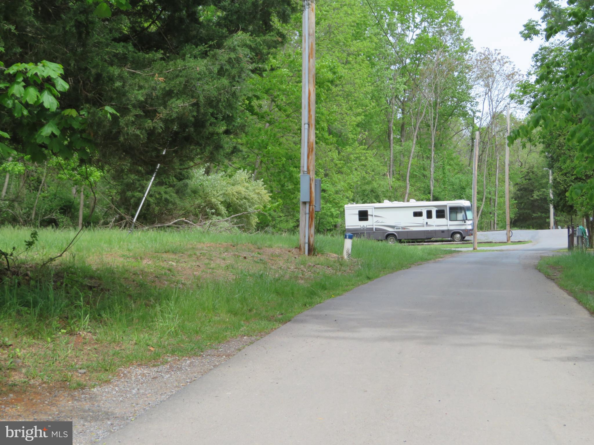 139-118 Boo Boo Boulevard Falling Waters, WV 25419 - Photo 19 of 19 View Of The Road Leaving The Lot