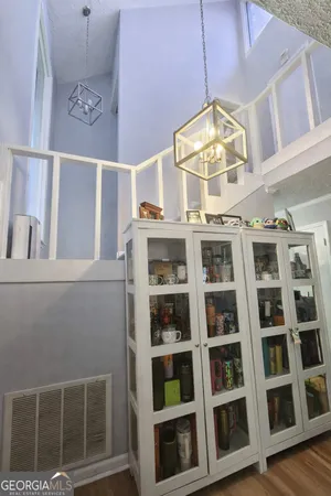 a view of a living room with a large window