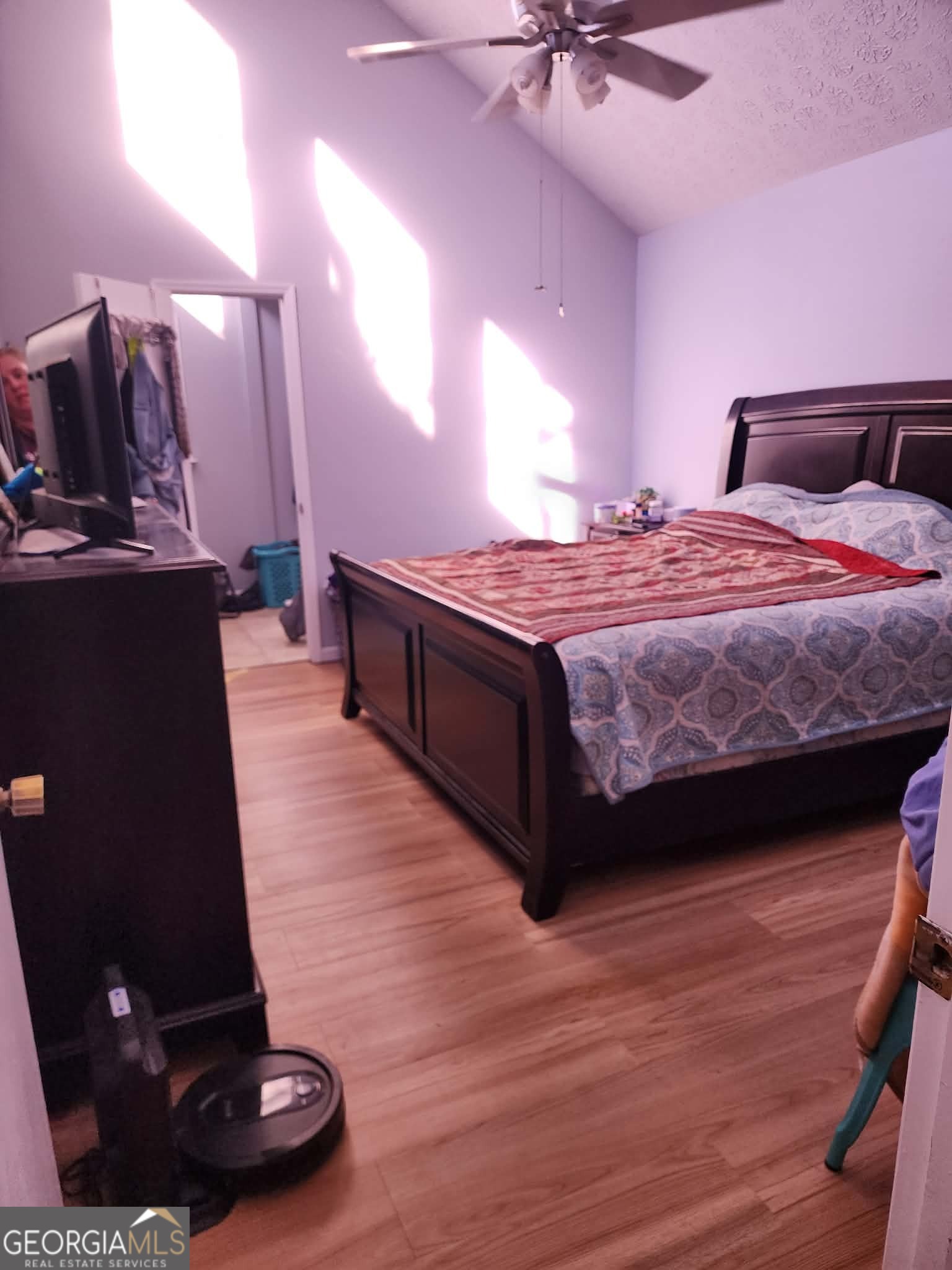 167 1st Avenue Cochran, GA 31014 - Photo 14 of 19 a bedroom with a bed and a ceiling fan