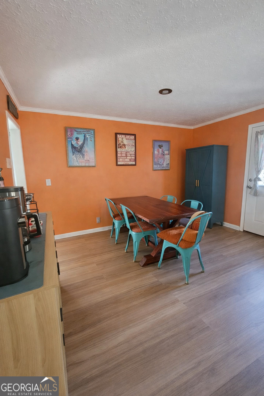 167 1st Avenue Cochran, GA 31014 - Photo 7 of 19 a view of a room with furniture and wooden floor