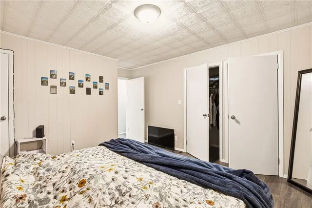 a room with furniture and wooden floor