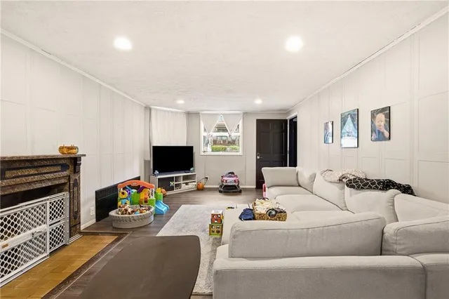 a room with furniture and a wooden floor