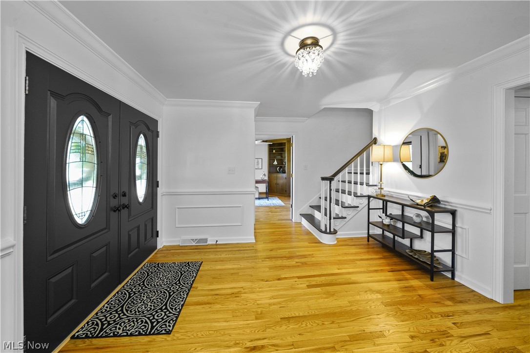 7231 Stow Road Hudson, OH 44236 - Photo 3 of 46 Foyer with restored hardwood floors