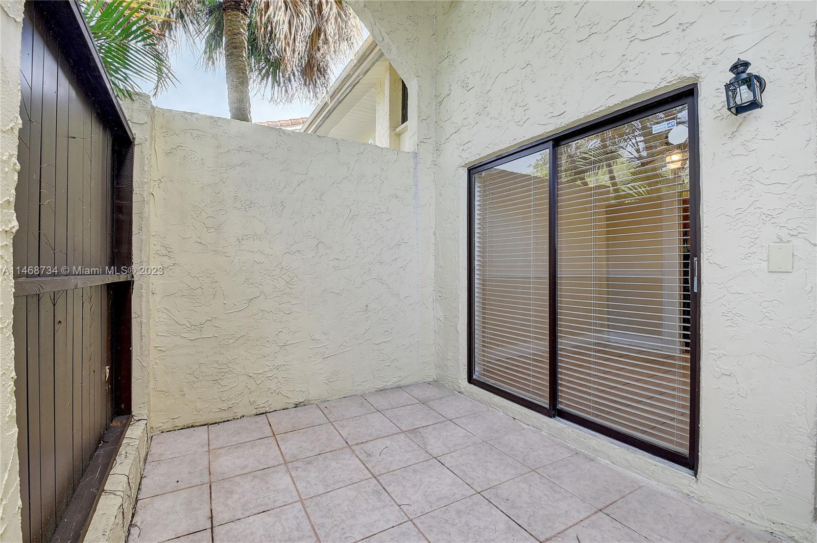 Sandalfoot Cove Boca Raton, FL 33428 - Photo 11 of 44 a view of a closet area with ceiling fan