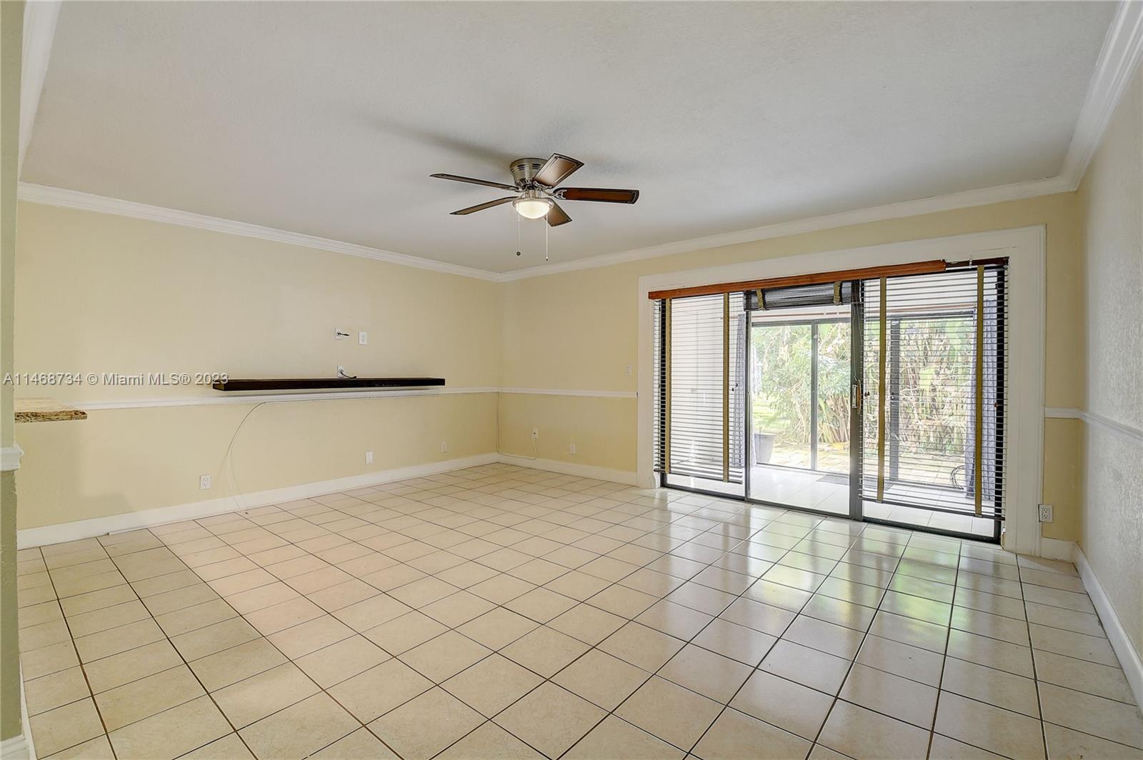 Sandalfoot Cove Boca Raton, FL 33428 - Photo 13 of 44 a view of an empty room and window