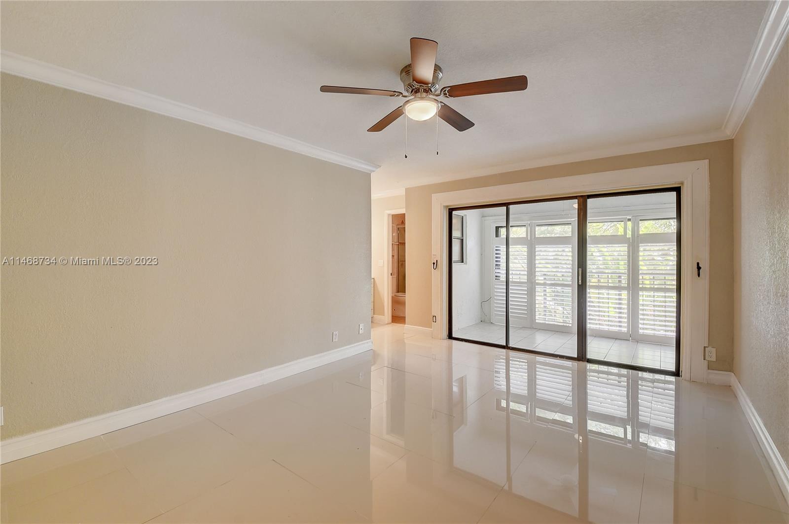 Sandalfoot Cove Boca Raton, FL 33428 - Photo 19 of 44 a view of an empty room with a window