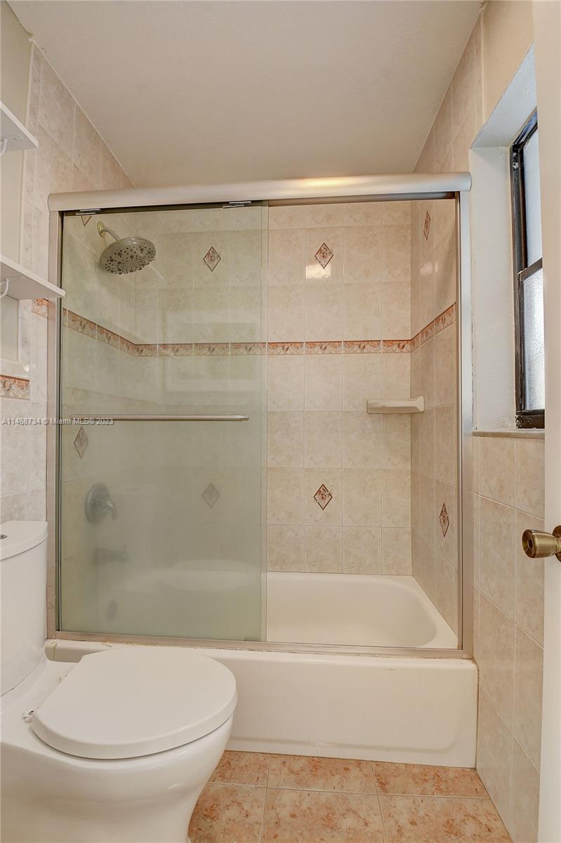 Sandalfoot Cove Boca Raton, FL 33428 - Photo 20 of 44 a bathroom with a toilet and a shower