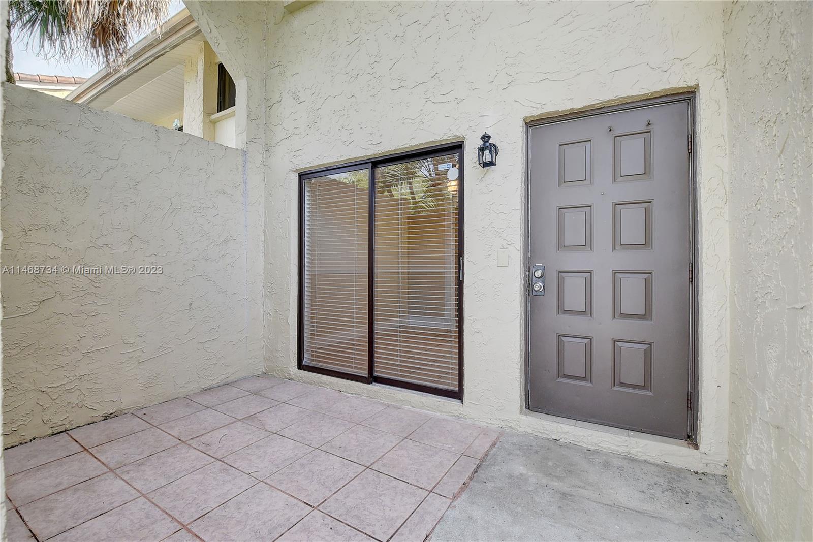 Sandalfoot Cove Boca Raton, FL 33428 - Photo 2 of 44 an empty room with windows