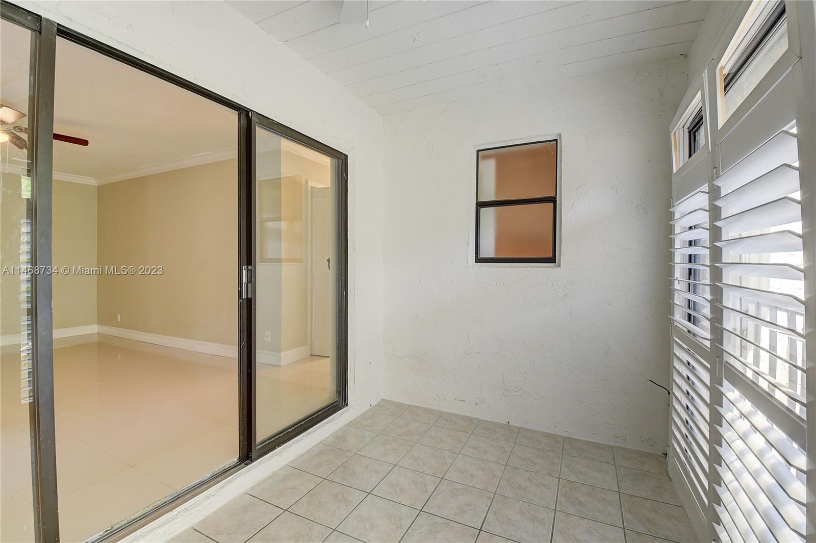 Sandalfoot Cove Boca Raton, FL 33428 - Photo 27 of 44 a view of an empty room with a window