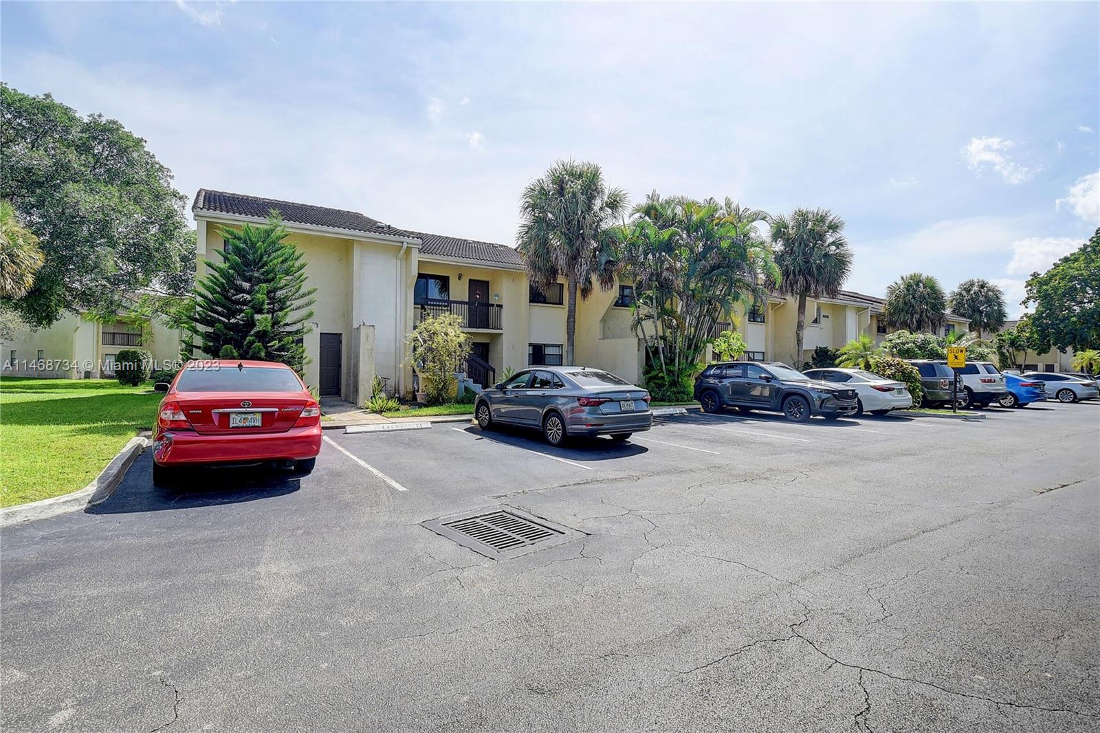 Sandalfoot Cove Boca Raton, FL 33428 - Photo 35 of 44 a car parked in front of a house