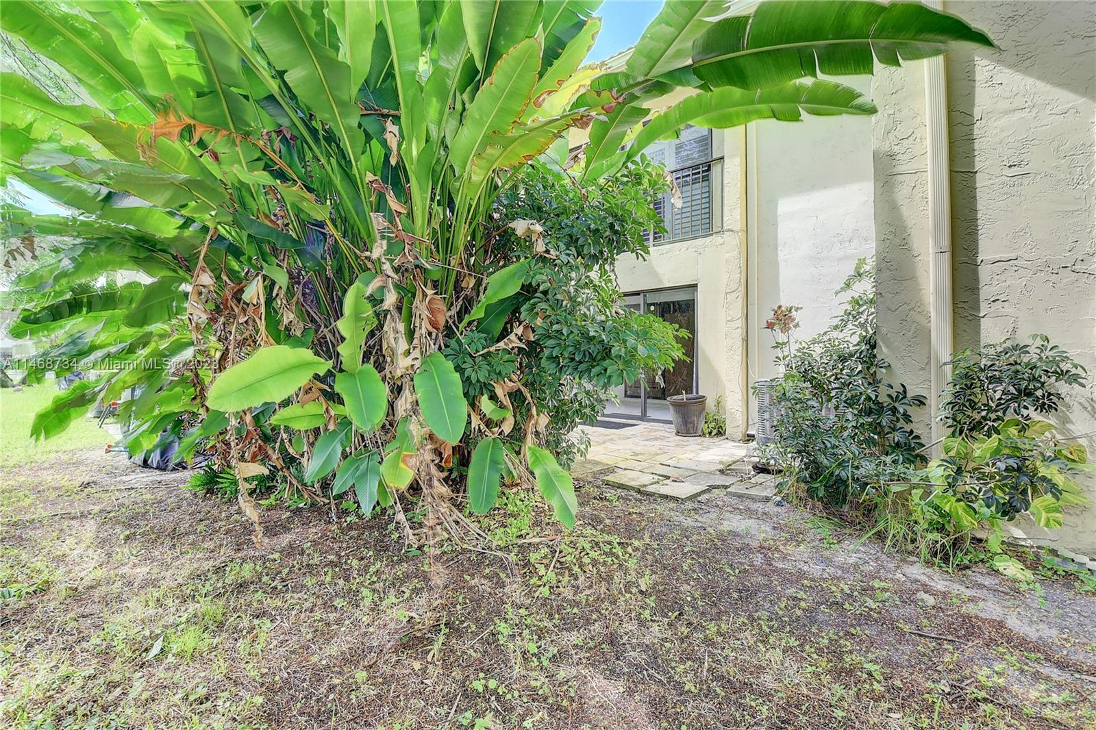 Sandalfoot Cove Boca Raton, FL 33428 - Photo 36 of 44 a view of a yard with plants