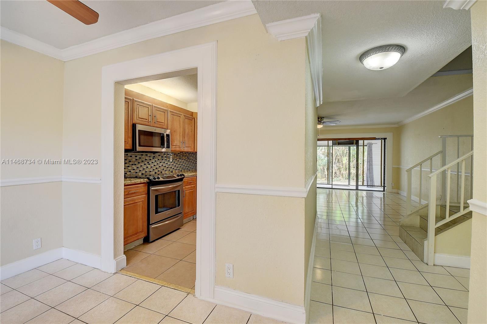 Sandalfoot Cove Boca Raton, FL 33428 - Photo 6 of 44 a hallway with a appliances