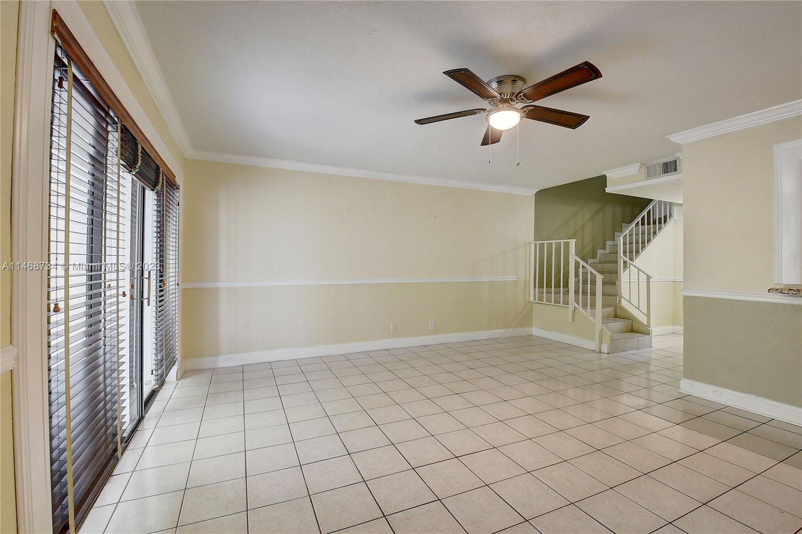 Sandalfoot Cove Boca Raton, FL 33428 - Photo 9 of 44 a view of an empty room with a window